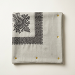 Back-left shawl with dark embroidery