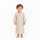 Beige sleep galabiya on a 3-year-old, white background