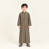 Brown jalabiya on a 6-year-old