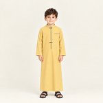 Yellow jalabiya on a 6-year-old