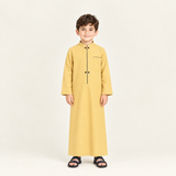 Yellow jalabiya on a 6-year-old